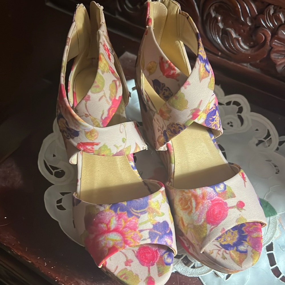 Adorable Bamboo floral wedges, never worn. Zip up back.  Size 7